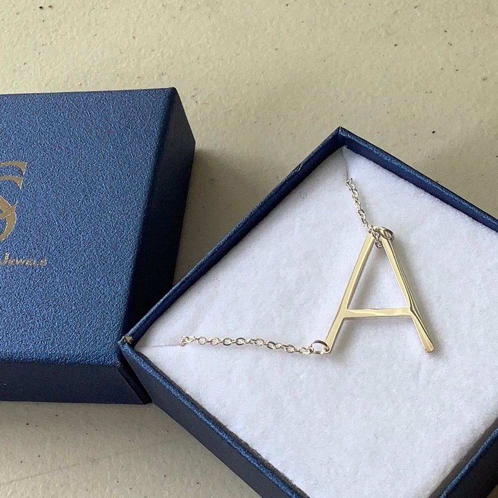 Savvy Cie NWT & Box
Rhodium Plated Initial…